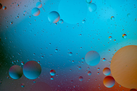 Closeup of oil droplets in water. Colorful macro shot.のeditorial素材