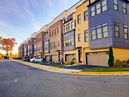 row of modern brick townhouses with garagesのeditorial素材