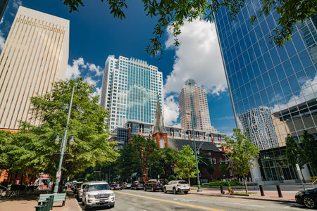 Charlotte architecture with roads and skyscrapers downtown. A place of attraction for tourists.