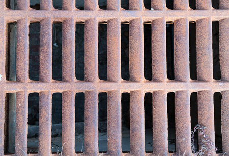 Cast-iron, rusty ventilation grille close-up.の写真素材