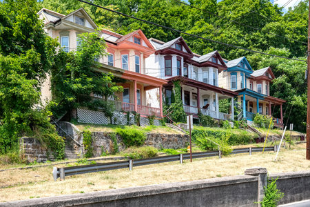 Vintage timber townhouses with paved sidewalk in Cumberland, Moreland.の写真素材