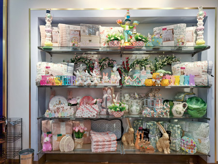 Easter decorations: flowers, bunnies, eggs and napkins. Festive decoration of the store counters.のeditorial素材