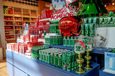 rows of brightly colored bottles of shower and bath gels on the shelves at the store.のeditorial素材