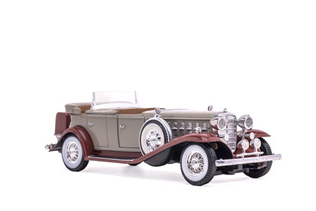 1932 Cadillac Phaelon sand color. Toy model. Isolated on white background.のeditorial素材