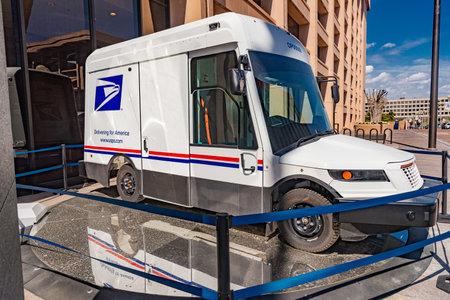 The US Postal Service in Washington. New electric mail delivery vehicle on display.のeditorial素材