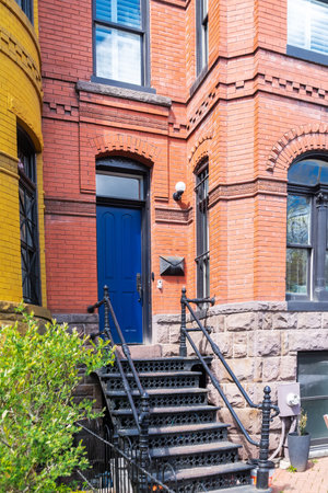 residential area in the center of Washington. Urban red brick architecture. Entrance to the...