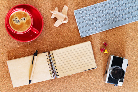 Travel notes laid out on a cork board. Travel dreams start with preparation.の写真素材