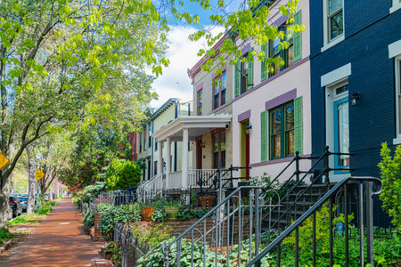Washington Street with colorful townhouses. Picturesque row of houses near the city center.の写真素材
