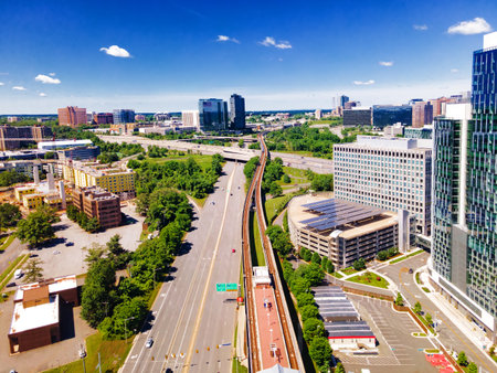 Metro station at the Modern Buildings in Tysons Corner, Fairfax County, Virginia, USA. View from a drone.の写真素材