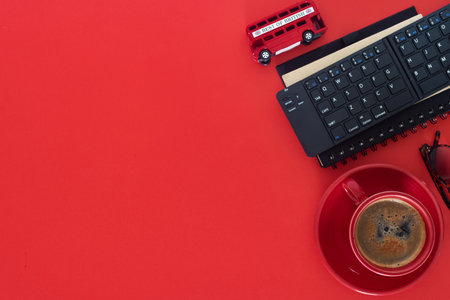 Minimal business setup with coffee and digital tools. A clean and stylish workspace.の写真素材
