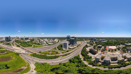 Corporate zone in Tysons, VA. Aerial panorama of urban expansion.