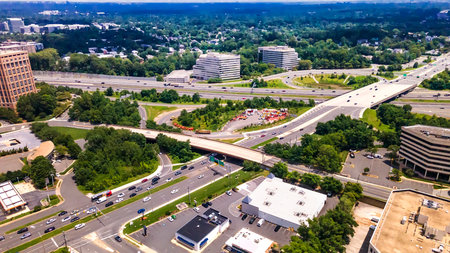 Tysons Virginia Urban Skyline with Traffic Arteries Aerial cityscape showcasing modern buildings and...