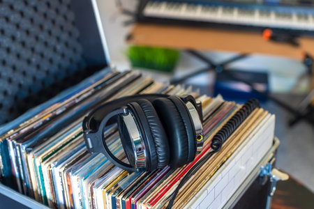 Music Listening Concept â€“ Headphones and Vinyl Collection in Studio Setup