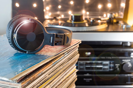Hi-fi stereo turntable and vinyl record stack for vintage music loversの写真素材