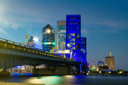 Illuminated city buildings in Jacksonville's financial district at twilightの写真素材