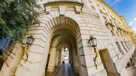 An architectural passageway framed by classical columns and arches in Washington, DCの写真素材