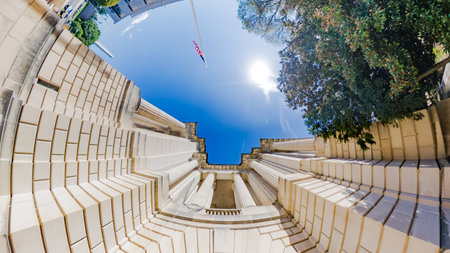 Dramatic architectural composition from the base of a Washington, DC landmark. Featuring columns,...