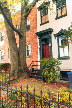 Red Door Entrance of Historic Townhouse in Washington DC During Autumn