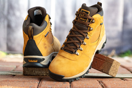 Durable leather Timberland footwear for trekking and travel.