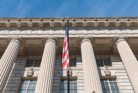 Classic architecture with US flag in Washington DCの写真素材