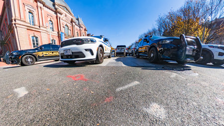 Washington DC police-cars on a sunny day near famous government buildingsのeditorial素材