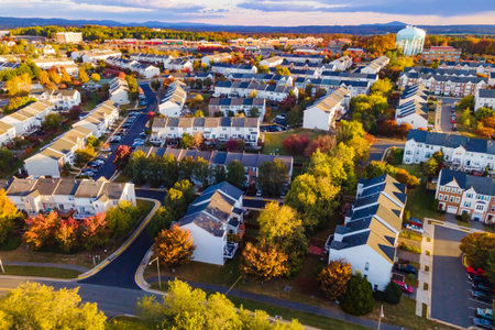 Drone shot of a quiet suburban residential complex near Washington, DC, at sunriseの写真素材