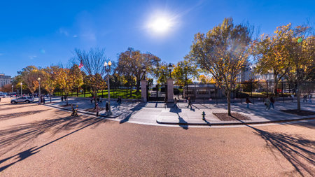 Autumn street scene near the White House in Washington DC with tourists