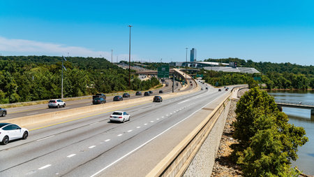 Highway traffic on multi lane road near river in Washington DC urban areaのeditorial素材