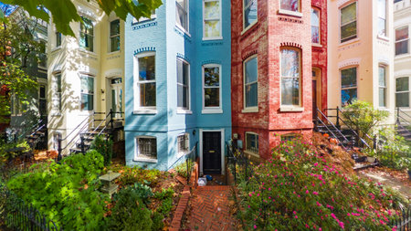 residential street scene with historic architecture trees and courtyard in Washington DCの写真素材