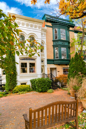 Urban living scene with brick townhouse and fall leaves Washington DCの写真素材
