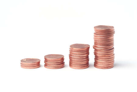 Stacks of used euro cents on a white background