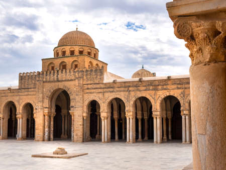 The Great Mosque at Kairouan in Tunisia is one of the most impressive and largest Islamic monuments in North Africa and is one of the oldest places of worship in the Islamic world.の写真素材