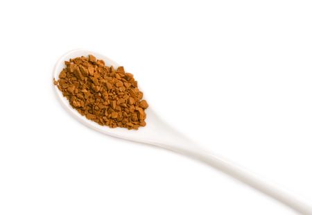 Full spoon of coffee on the white backgroundの写真素材