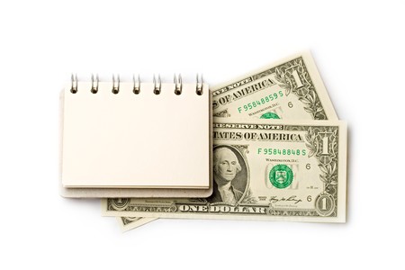 Notepad, dollar isolated on white の写真素材