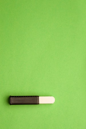 Chalk isolated on green
