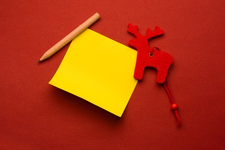 Reindeer isolated on the red background. の写真素材