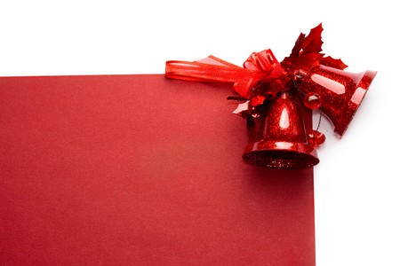 Red christmas bells isolated on white background の写真素材