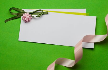 Greeting card isolated on greenの写真素材
