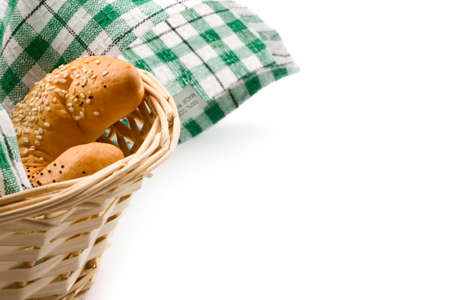 Bun in the basket isolated on whiteの写真素材