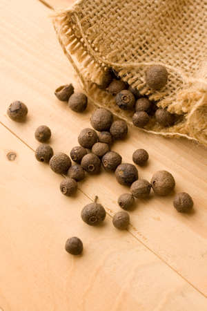 Pepper isolated on wooden backgroundの写真素材