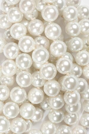 Pile of pearl on the white backgroundの写真素材