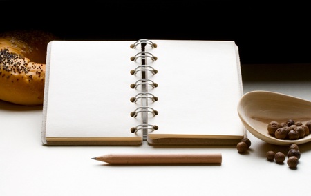 Notepad, bun and pepperの写真素材