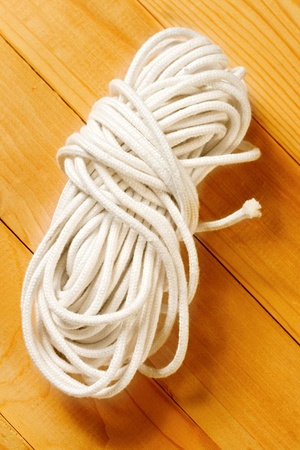 Twine on the wooden backgroundの写真素材