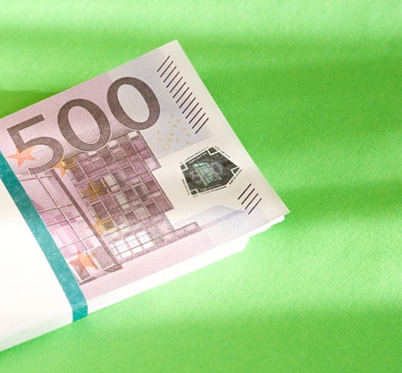 Euros isolated on green backgroundの写真素材