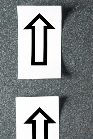 Arrows isolated on grey backgroundの写真素材