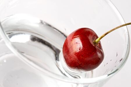 Cherry in glass with water