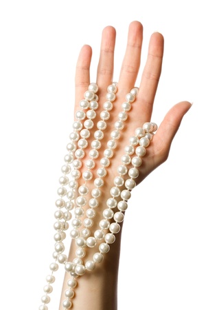 Pearl in the woman handの写真素材