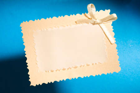 Greeting card isolated on the blue backgroundの写真素材