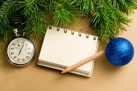 Christmas tree, stopwatch and notepadの写真素材
