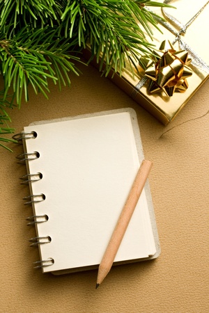 Christmas tree, gift and notepadの写真素材